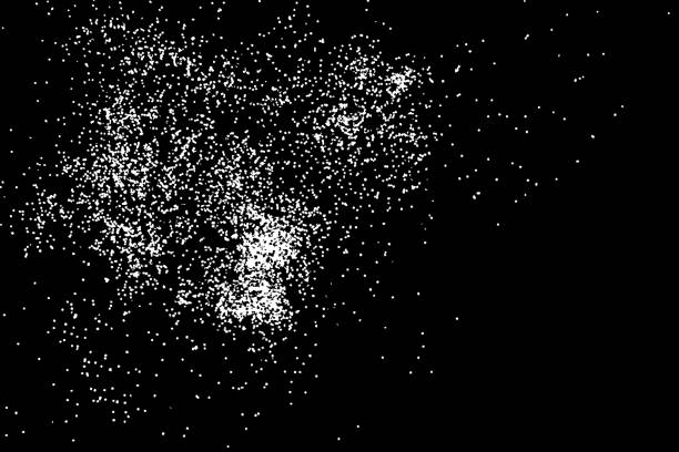 istock Abstract grainy texture isolated on black background. Top view. Dust, sand blow or bread crumbs. Silhouette of food flakes such as salt or almond or wheat flour spread on the flat surface or table. 876229996
