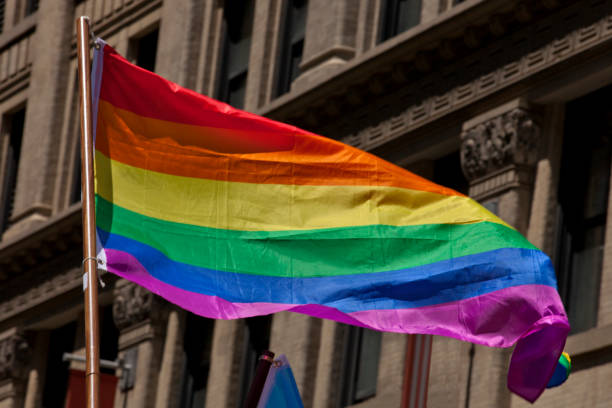 istock New York City Pride Parade - Flags 876236304
