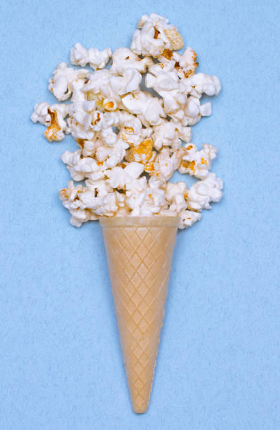 istock Popcorn in ice cream cones. Top view 876242166