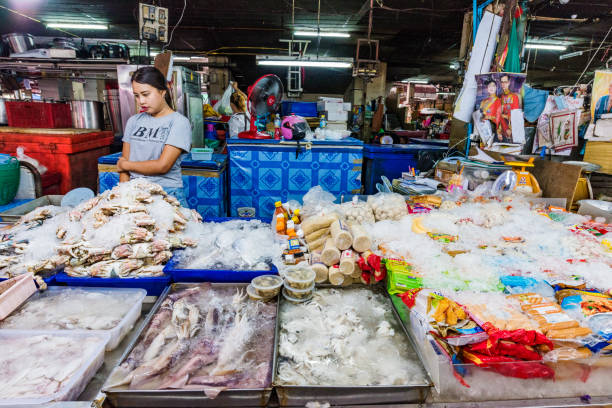 Seafood market stall Chiang Mai: This is seafood market stall in Warorot market a popular local market on July 27, 2017 in Chiang Mai warorot stock pictures, royalty-free photos & images