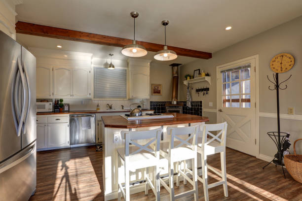 istock Newly renovated Kitchen boasts wood beams on ceiling 876250974