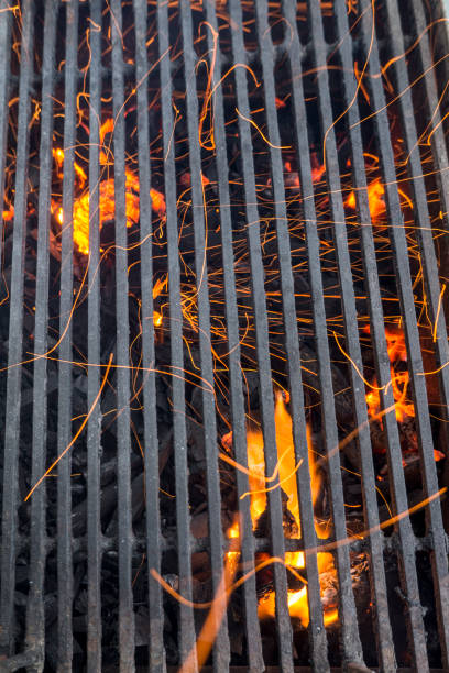 istock Barbecue Fire Grill Isolated On The Black Background, Close-up 876272472