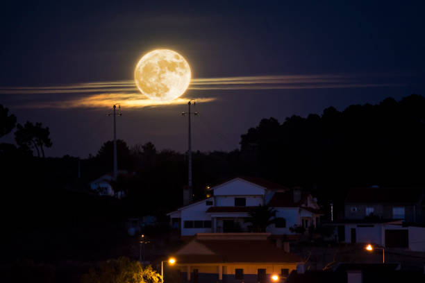 istock Moonrise in the city. 876275272