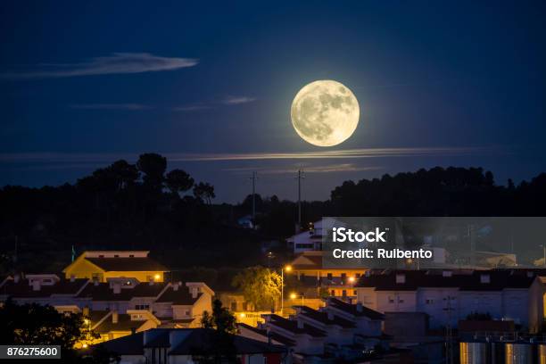 Moonrise In The City Stock Photo - Download Image Now - Supermoon, Full Moon, City