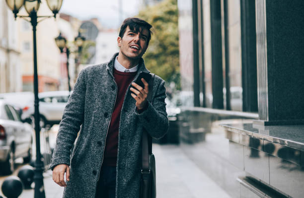 istock Man texting in the city 876275848