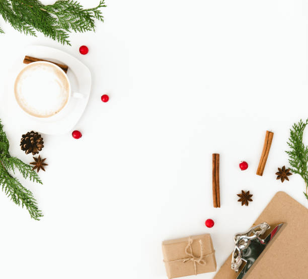 istock Christmas composition with gift box and decorations over white background. Flat lay. Copy space 876289468