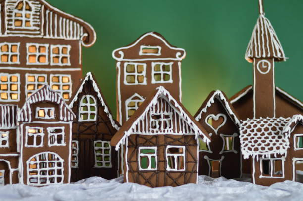 istock home made gingerbread village with green background 876291896