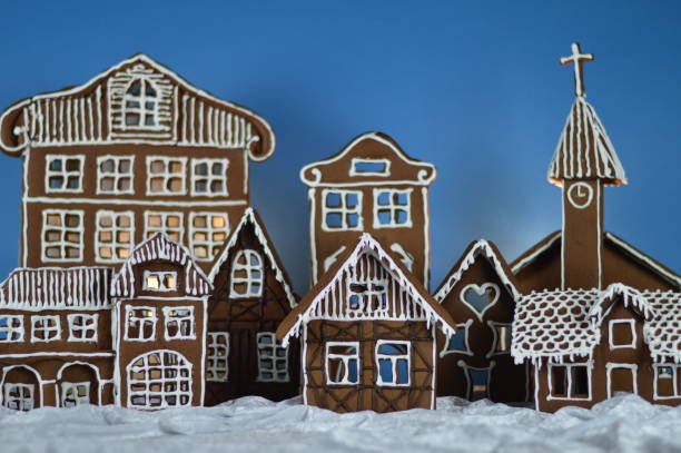 istock home made gingerbread village with blue background 876292056