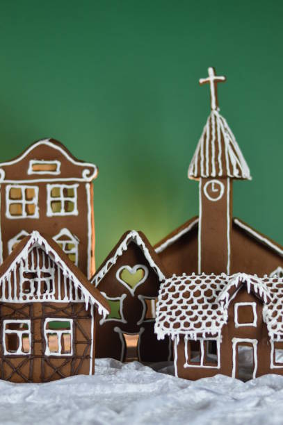 istock home made gingerbread village with green background 876292184