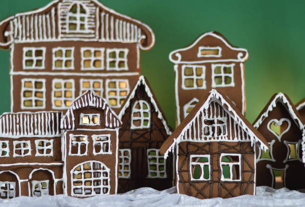 istock home made gingerbread village with green background 876292558