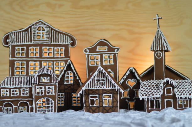 istock home made gingerbread village with wooden background 876296834