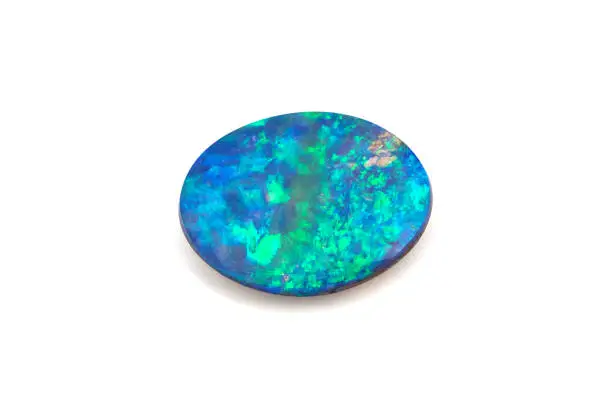 Natural Boulder Opal gemstone on white background