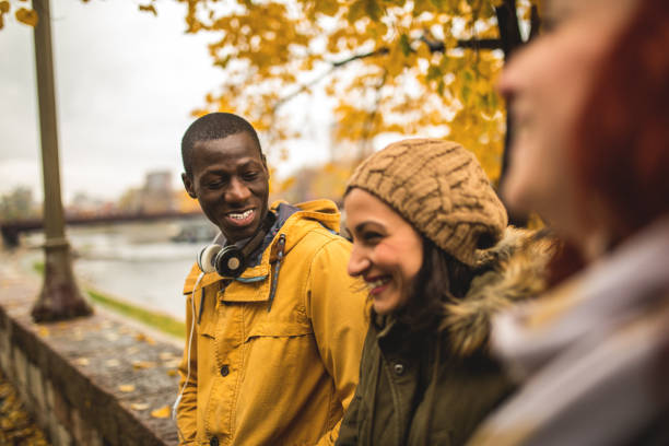 istock Multi ethnic group of friends having fun outdoors 876314956