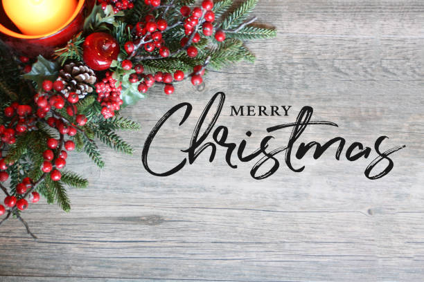 Merry Christmas Text, Candle, Pine Tree Branches and Berries in Top Corner Over Rustic Wood Merry Christmas Text, Festive Holiday Candle, Pine Tree Branches and Berries in Top Corner Over Rustic Wood Background needle plant part photos stock pictures, royalty-free photos & images