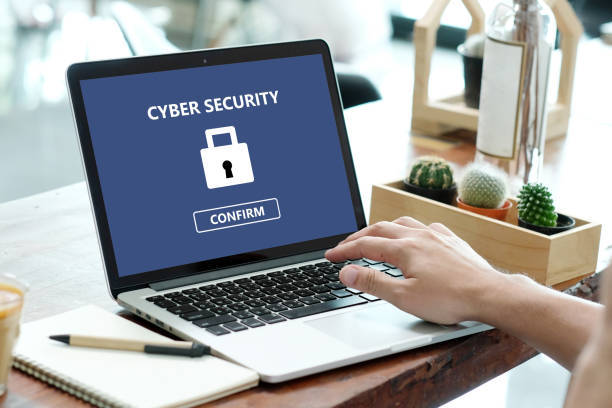 istock Man typing laptop with cyber security confirm on screen background, cyber security concept 876317626
