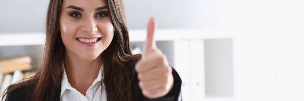 istock Beautiful smiling woman showing ok or approval 876321898