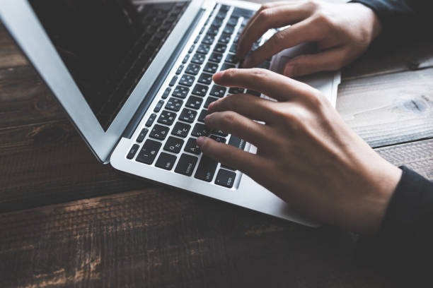 istock Laptop operation, body parts 876335734