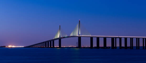 Sunshine Skyway Bridge, Blue Hour, Evening, Tampa Bay, Suspension Bridge, Clearwater FL at night, long exposure Sunshine Skyway Bridge, Blue Hour, Evening, Tampa Bay, Suspension Bridge, Clearwater FL at night, long exposure clearwater florida photos stock pictures, royalty-free photos & images