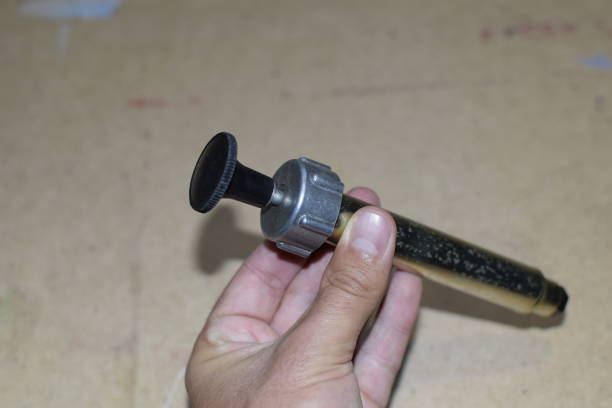 istock Piston for pumping air into a blowtorch 876350326