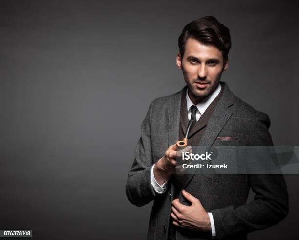 Handsome Man With A Smoking Pipe Stock Photo - Download Image Now - Suit, Tweed, 30-34 Years