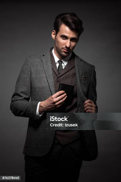 Businessman Keeping Wallet In The Jacket Stock Photo - Download Image Now - Wallet, Men, Blazer - Jacket