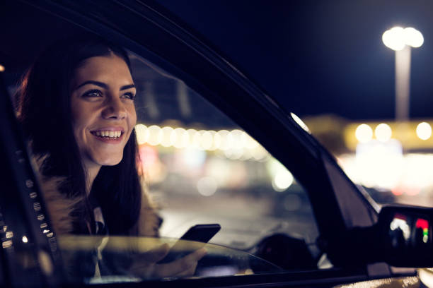 istock Beautiful brunette in car 876378520
