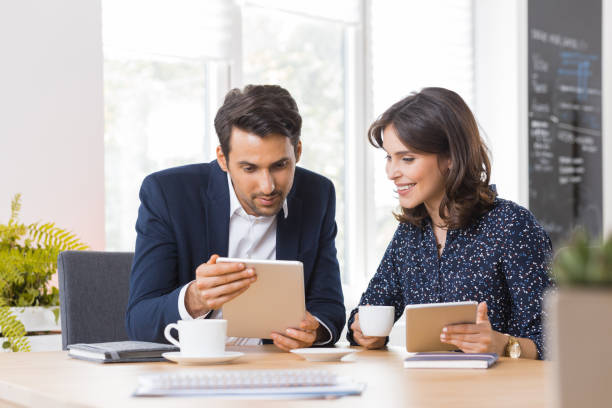 istock Business couple having lunch meeting 876385648