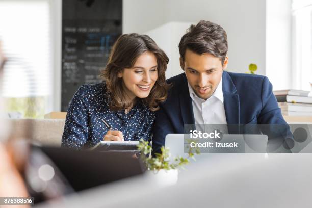 Business People Working With Laptop In Cafe Stock Photo - Download Image Now - Adult, Adults Only, Advice