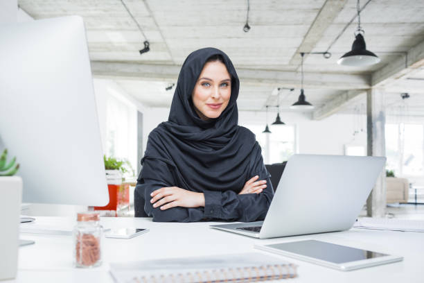 istock Muslim business woman at work in modern office 876396620