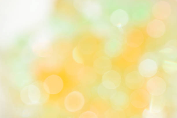 istock Glittering bokeh circular white on orange background  and empty space for text. 876397246