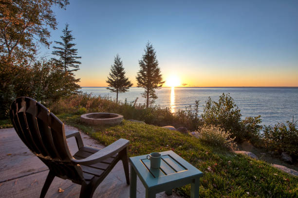 Chair and Table over looking Lake Superior Autumn, Minnesota, Water, Trees, sunrise fire pit photos stock pictures, royalty-free photos & images