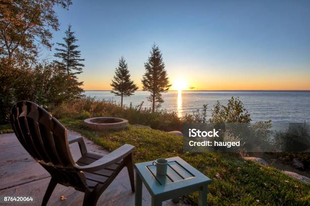 Chair And Table Over Looking Lake Superior Stock Photo - Download Image Now - Lake, Minnesota, Log Cabin