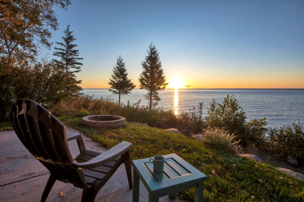 chair and table over looking lake superior - great lakes imagens e fotografias de stock