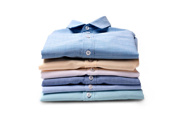 istock Classic men's shirts stacked on white background. 876424166