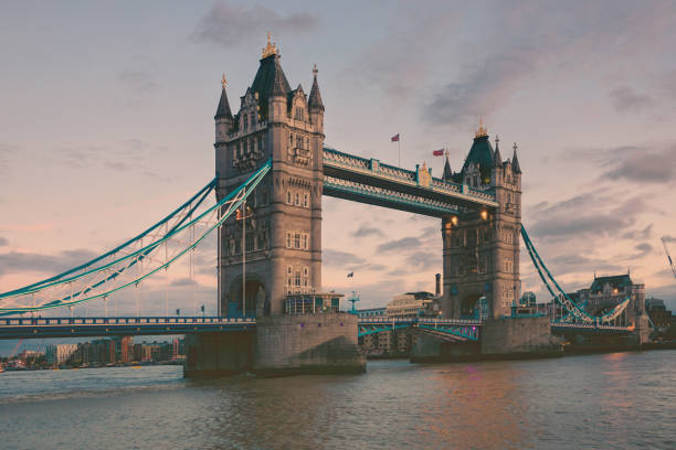 London Tower Bridge Embankment illuminated dusk River Thames panorama UK