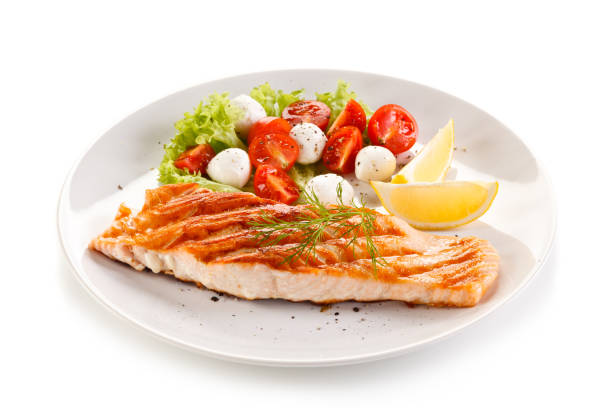 istock Fish dish - salmon steak and vegetables 876438712