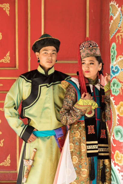 istock Couple in traditional Mongolian outfit. 876442654