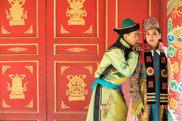 istock Couple in traditional Mongolian outfit. 876442660