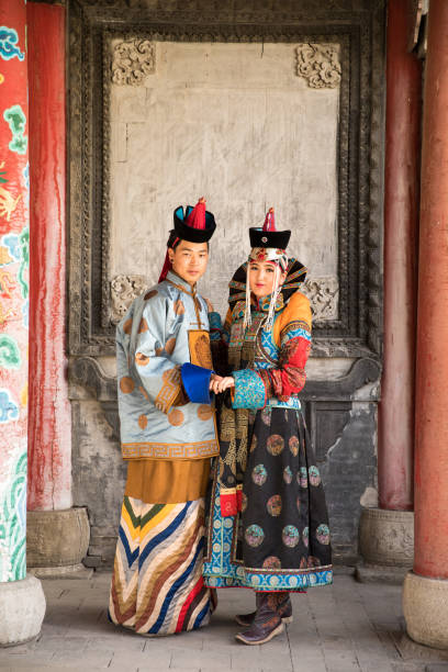 istock Couple in traditional Mongolian outfit. 876442662
