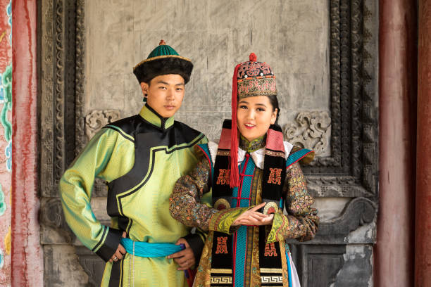Couple in traditional Mongolian outfit.
