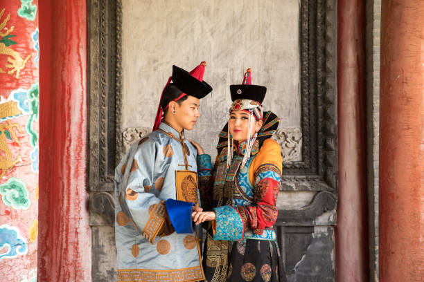 istock Couple in traditional Mongolian outfit. 876442680