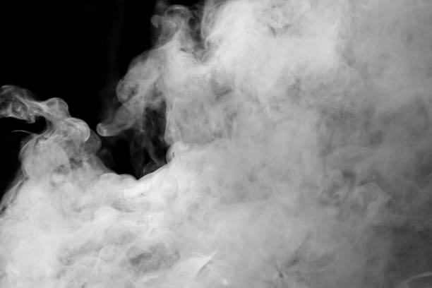 istock smoke from the leaves on a black background 876456660