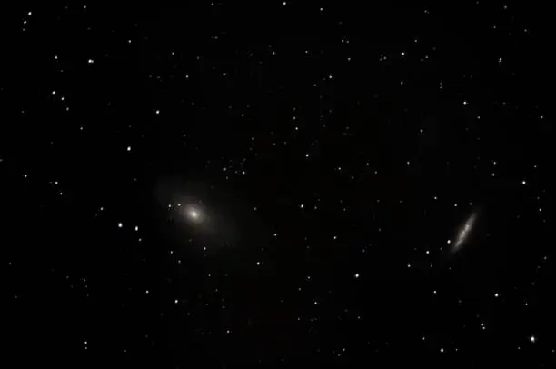 M81 and M82 are a pair of galaxies in the constellation Ursa Major. ... Messier 81 or M81 (also designated NGC 3031) is a spiral galaxy in the constellation Ursa Major. It has an apparent visual magnitude of 6.9 and its angular diameter is 21x10 arc-minutes.