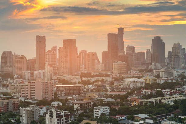 istock City business office downtown with sunset tone 876460530
