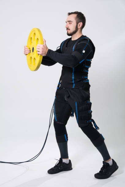 istock Fitness man in an electric stimulation suit 876463060