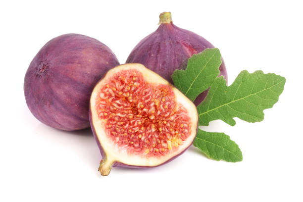 istock fig fruits with leaves isolated on white background 876466082