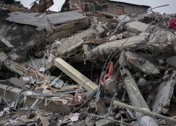 istock Modern destroyed building ruins closeup 876466750