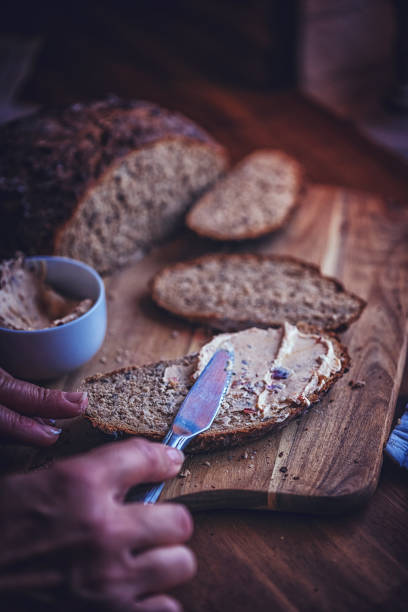 istock Fresh Homemade Brown Bread with Cream Cheese 876470854
