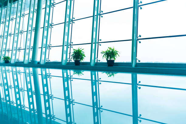 istock Empty hallway at an airport terminal 876477624
