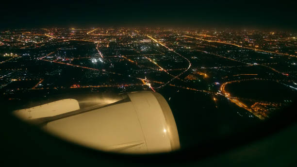 istock View from the window of an airplane at night 876478488